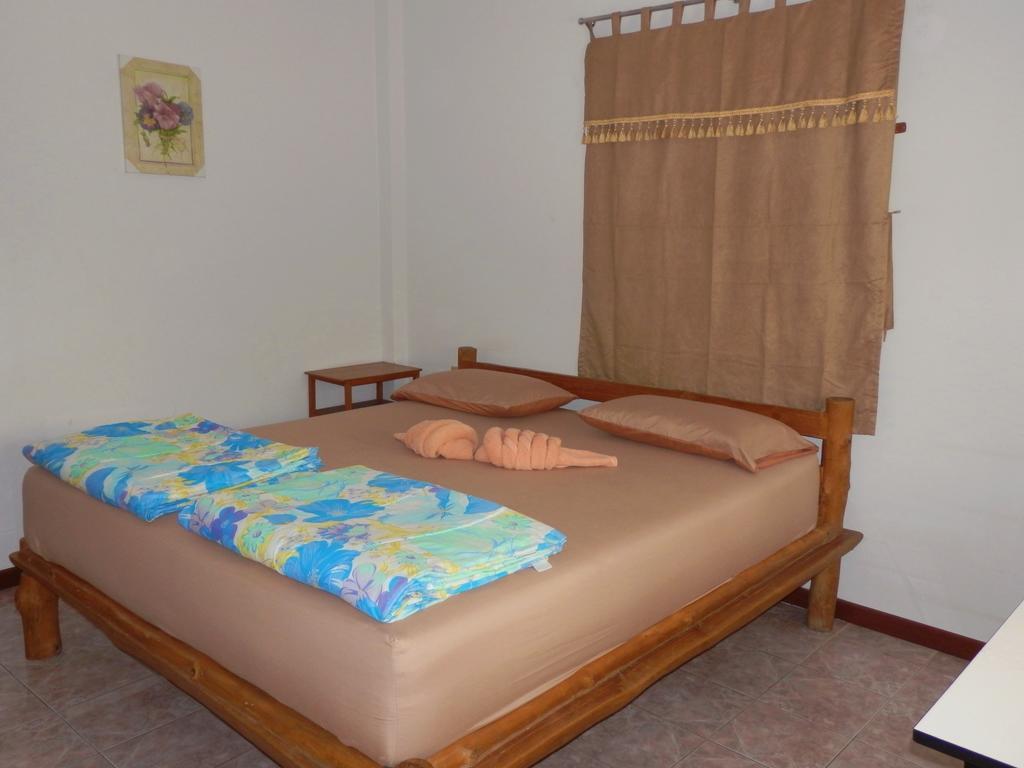 Mg Guesthouse Sukhothai Bagian luar foto